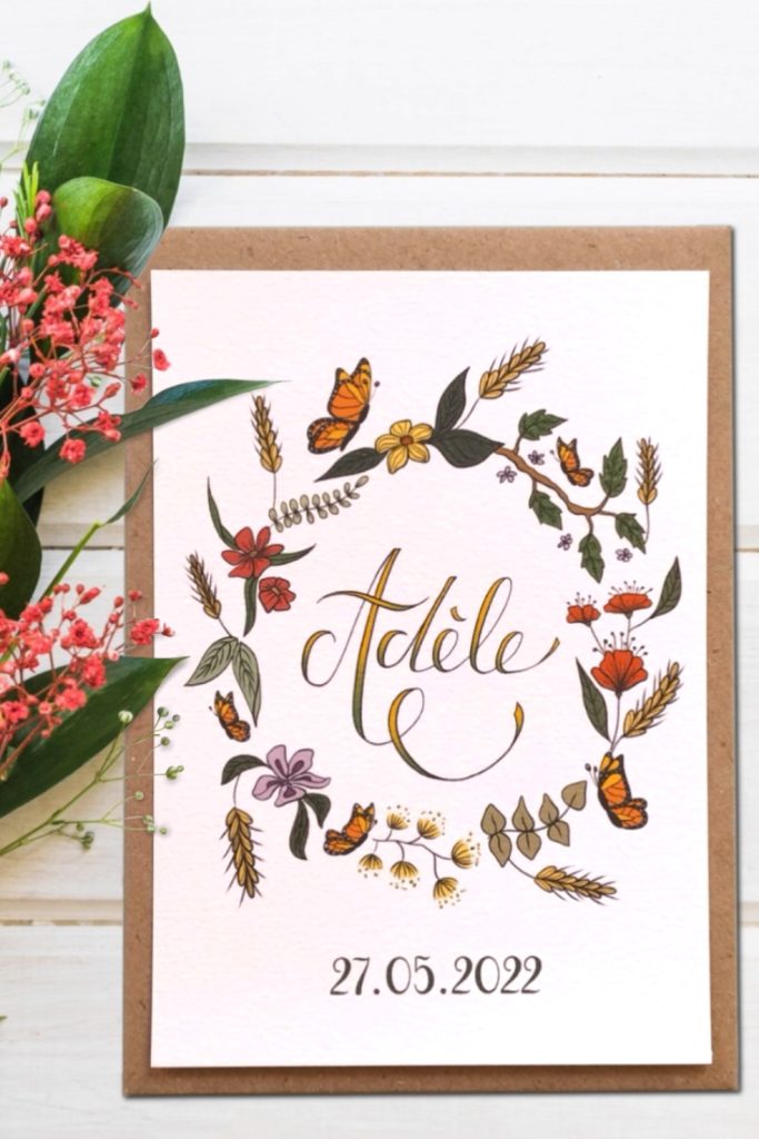 Faire-part de naissance avec couronne de fleurs des champs, création par Camille Fauquet, illustratrice freelance