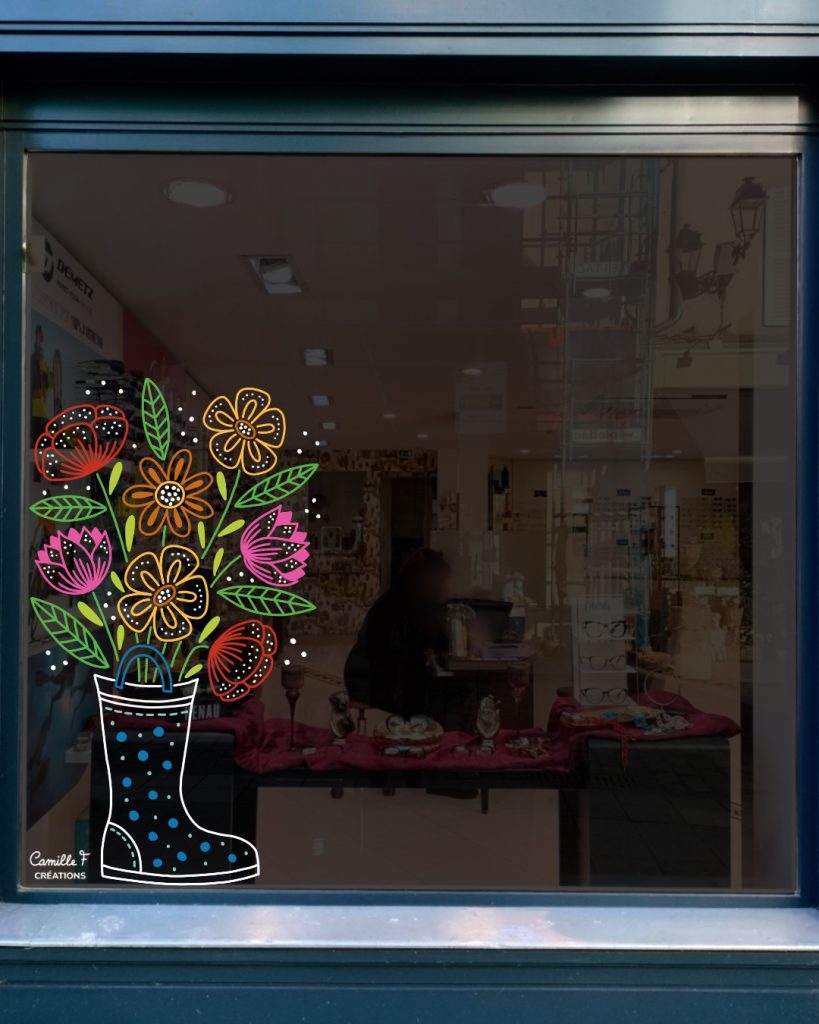 Peinture sur vitrine pour le printemps représentant un bouquet de fleurs dans une botte de pluie. Design par Camille F créations