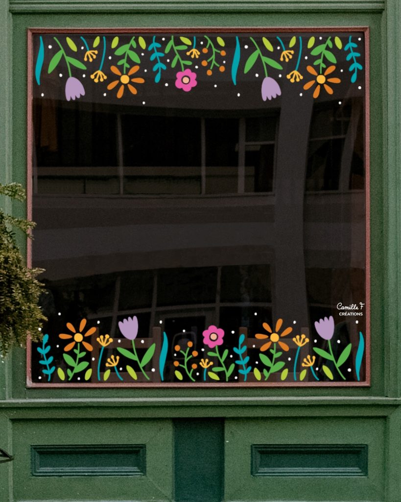 Peinture sur vitrine représentant des bordures supérieures et inférieures avec des fleurs et feuillages de printemps. Design par Camille F créations