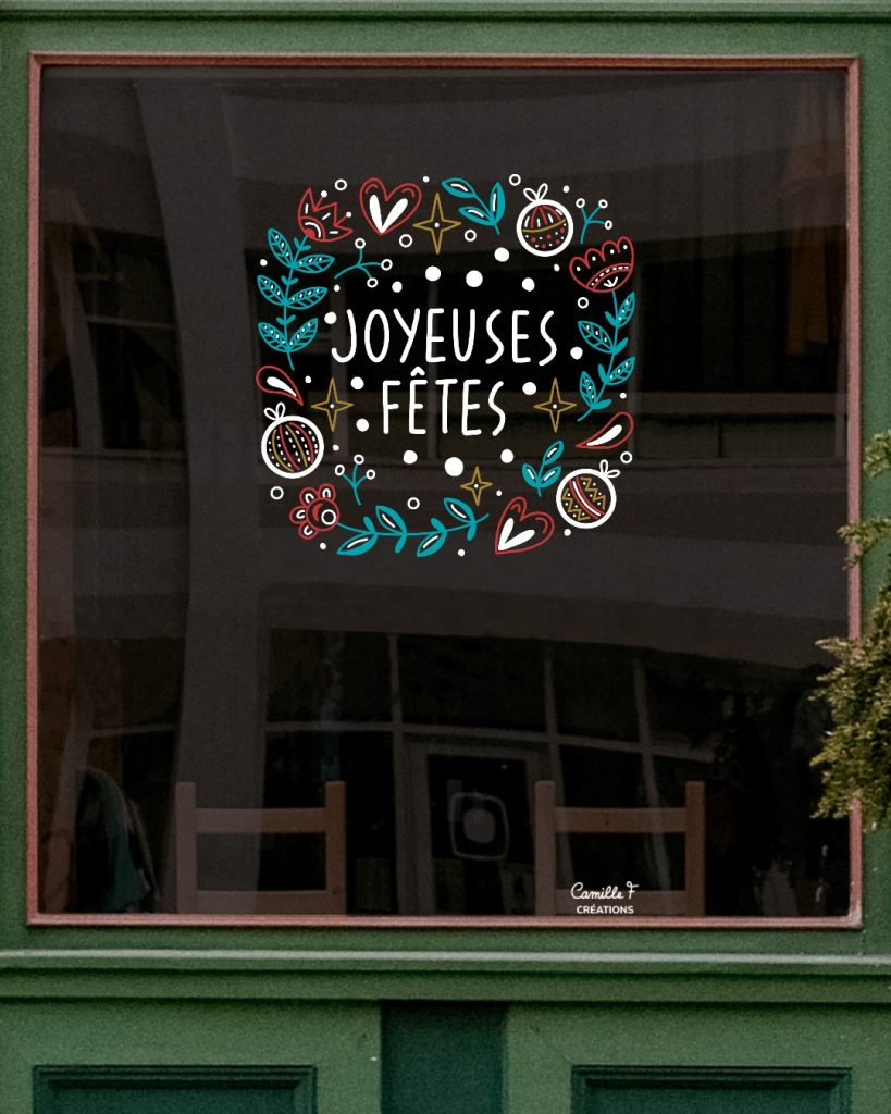 Peinture sur vitrine représentant une couronne de Noël style folklore europe de l'est avec l'inscription joyeuses fêtes, par Camille F créations, à Paris