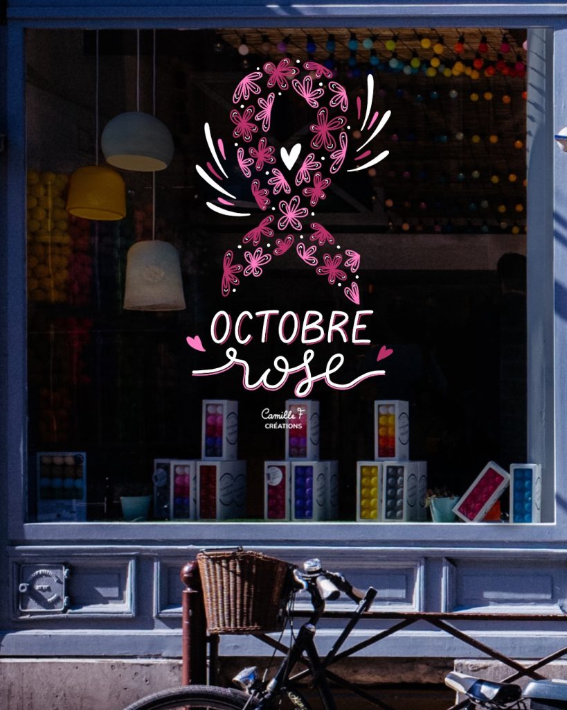 Peinture sur vitre pour Octobre Rose représentant le ruban avec des fleurs